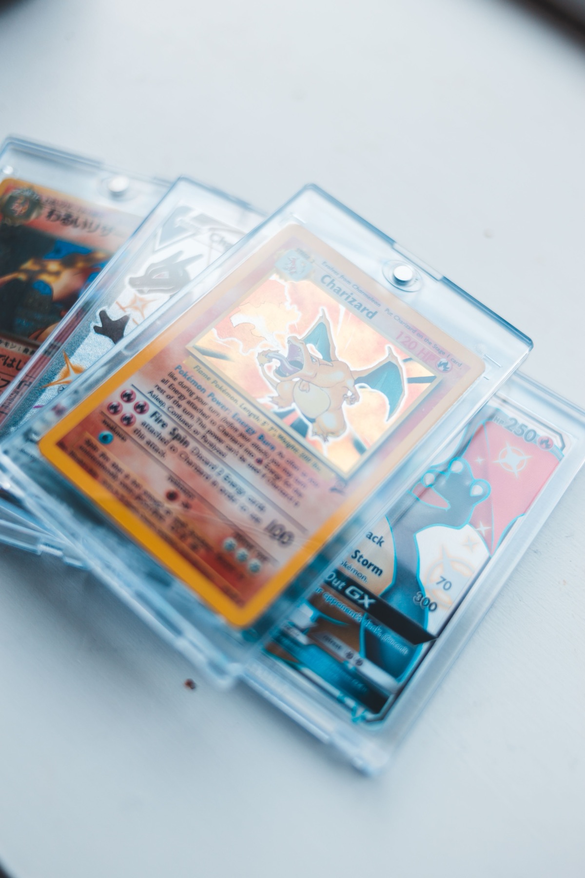 Trading cards stored in clear rigid protective holders